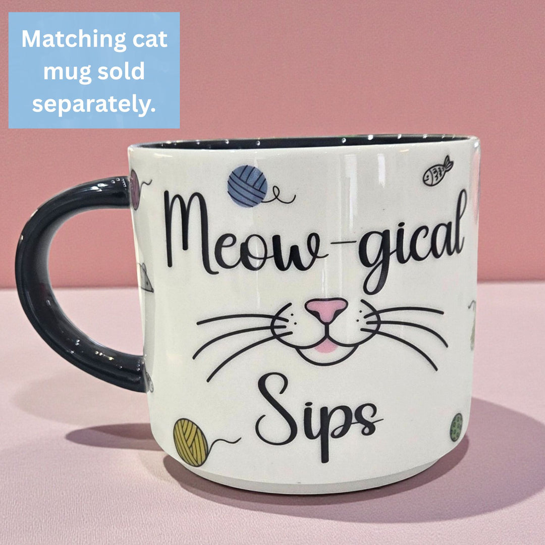 Mug with cat-themed design and text 'Meow-gical Sips' on a pink background. Sold separately.
