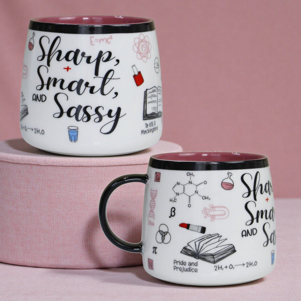 Two views of the same ceramic mug with 'Sharp, Smart, and Sassy' text and literary and scientific references.
